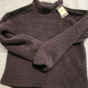 Under Armour Comfy Sherpa Pullover Coat. Grey with black details New with Tags.